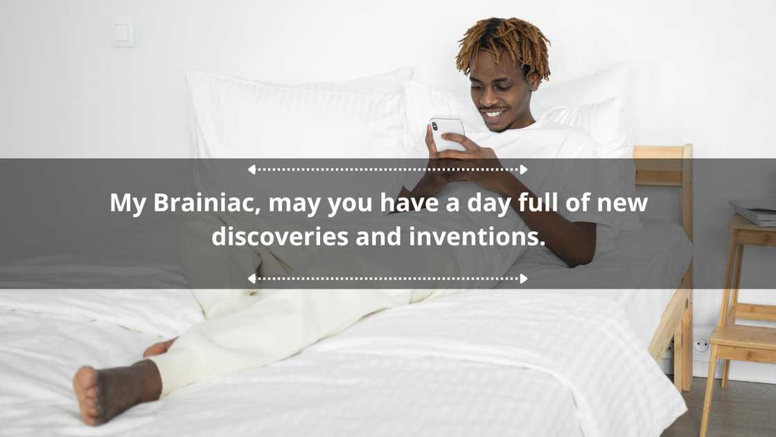 A man in bed browsing his phone A man in bed browsing his phone