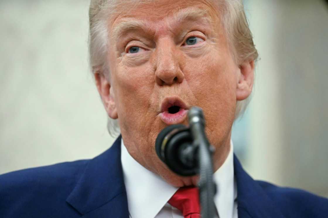 US President Donald Trump says using negotiating tactics to advance the interests of the United States is not the same as "chickening out" US President Donald Trump says using negotiating tactics to advance the interests of the United States is not the same as "chickening out"