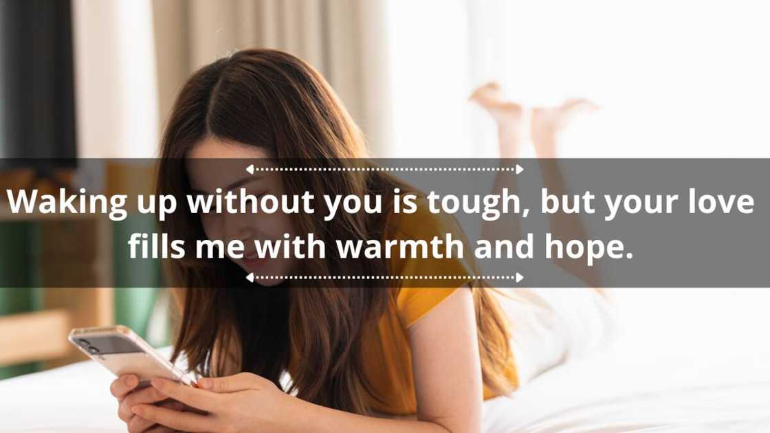 On bed, a young woman reads messages on her phone On bed, a young woman reads messages on her phone