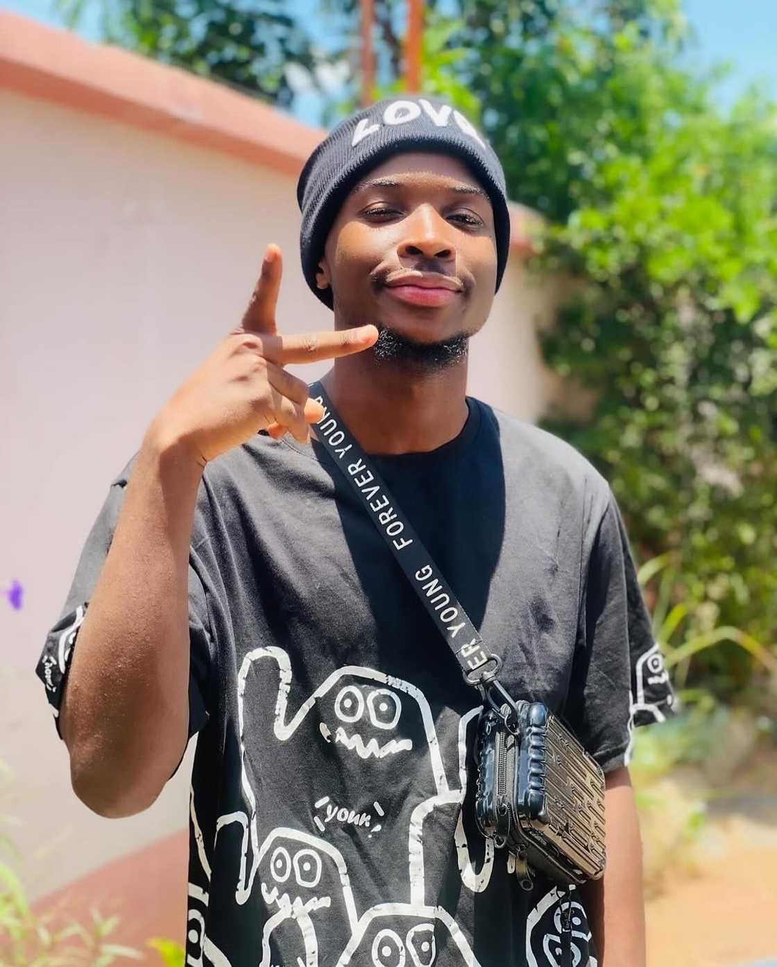 Rose Muhando's son. Rose Muhando's son.